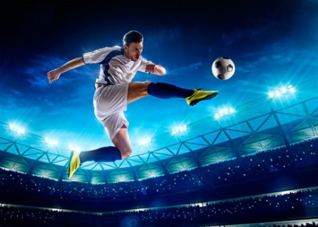 Football player in action photowallpaper Scandiwall