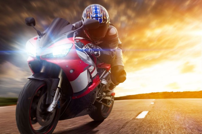 Sport Biker Racing on Road photowallpaper Scandiwall