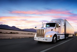 Image de Truck and Highway at Sunset