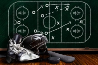 Picture of Ice Hockey Equipment and Chalk Board Play Strategy