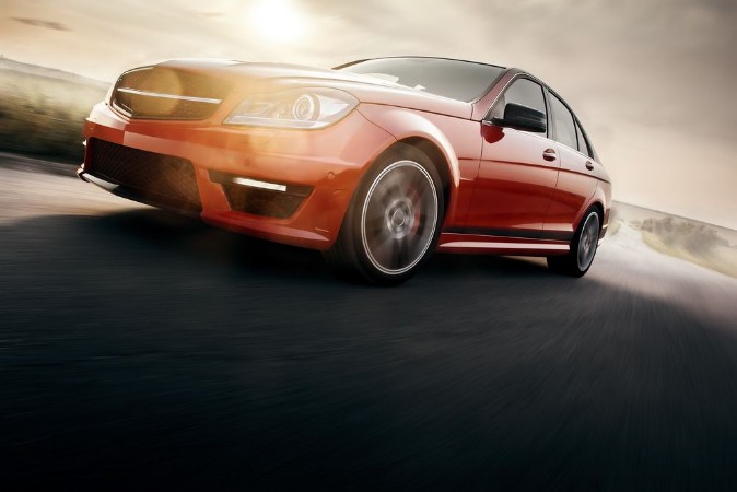 Afbeeldingen van Red Sport Car Fast Drive Speed On Asphalt Road