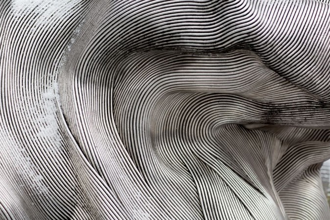 Image de Background texture of the shining metal surface The curved plate is made of iron