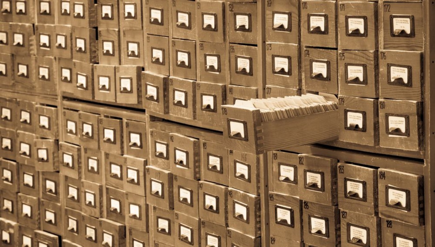 Picture of Old library or archive reference catalog with one opened card drawer Database and knowledge catalogue concept