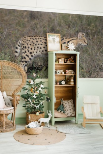 Afbeeldingen van Portrait of a Serval cat  Servals are excellent jumpers and can reach a height of 3 metres to reach out for its favourite food of birds on a small tree