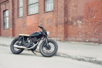 Pilt Vintage motorcycle in parking