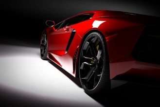 Image de Red fast sports car in spotlight black background Shiny new luxurious