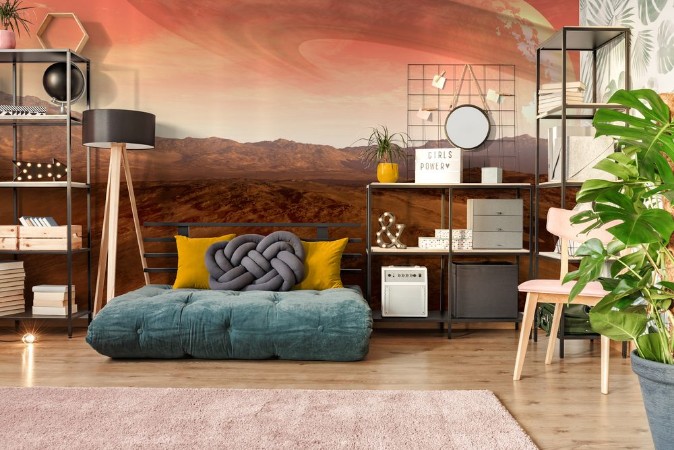 Afbeeldingen van A Mars-like red planet with an arid landscape rocky hills and mountains and a giant moon at the horizon with Saturn-like rings for space exploration and science fiction backgrounds