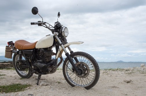 Picture of FreedomMotorbike under skyVintage photo effect added for create atmosphere