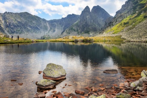 Picture of Mountain peaks reflected into the glacier lake