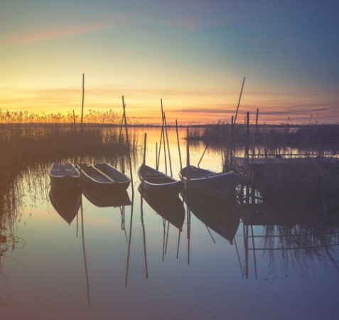 Picture of Marina on the lake boats moored to a wooden pier retro colors