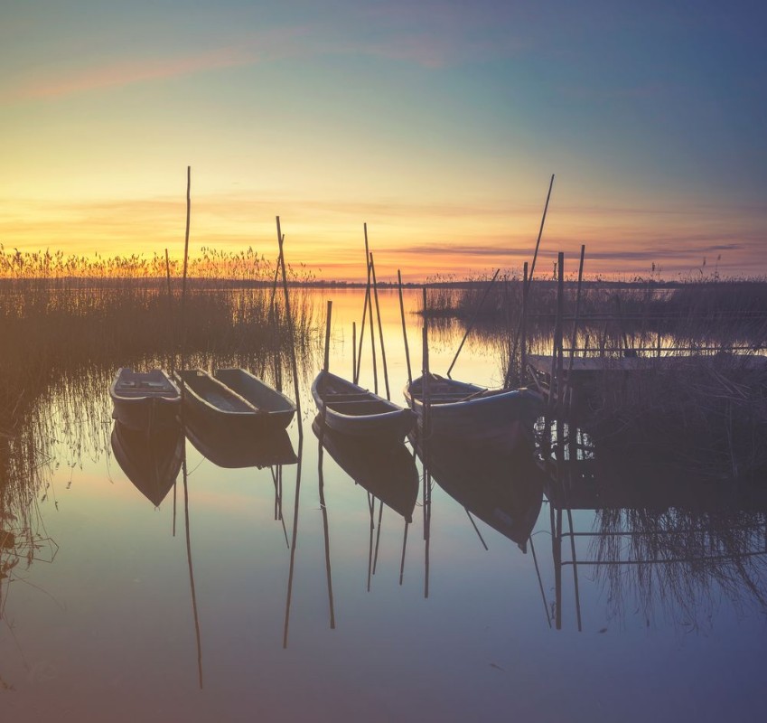 Picture of Marina on the lake boats moored to a wooden pier retro colors