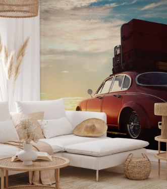 Pilt Retro red car with luggage on roof rack at sunset Travel vacation concepts