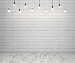 Picture of Painted brick wall and wooden floor with glowing light bulbs 3D rendering