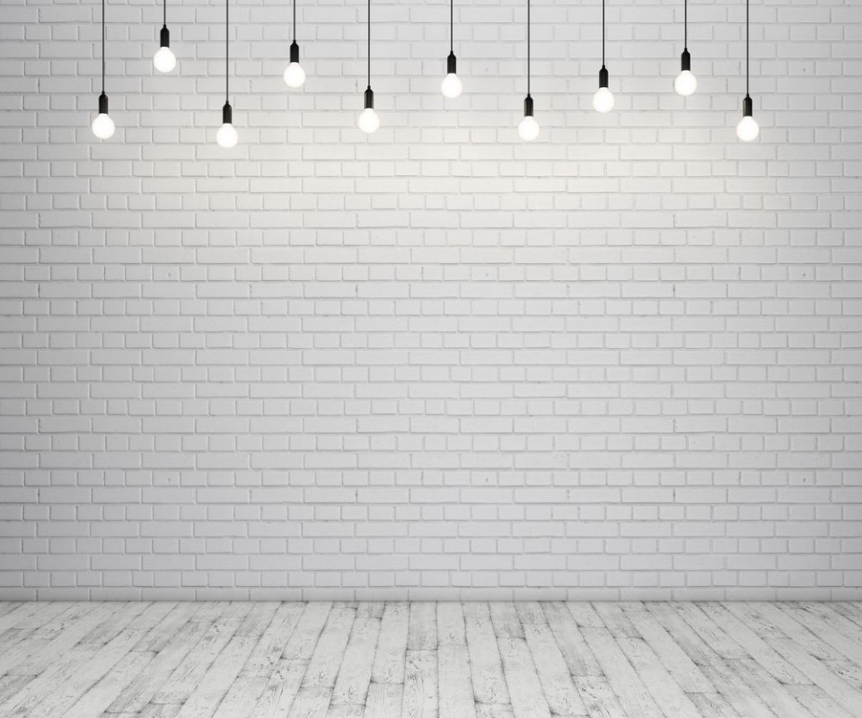 Afbeeldingen van Painted brick wall and wooden floor with glowing light bulbs 3D rendering