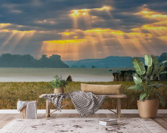 Bild på Amesbury Wiltshire United Kingdom - August 14 2016 Cloudy sunrise over Stonehenge - prehistoric megalith monument arranged in circle
