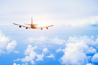 Picture of Airplane fly in the sky international passenger flight travel concept background