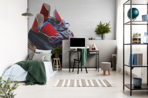 Picture of Vintage pair of mens ice skates on a white wooden surface