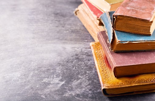 Picture of Old books on a dark table