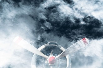 Picture of Vintage airplane propeller with radial engine on Cloud overcast weather