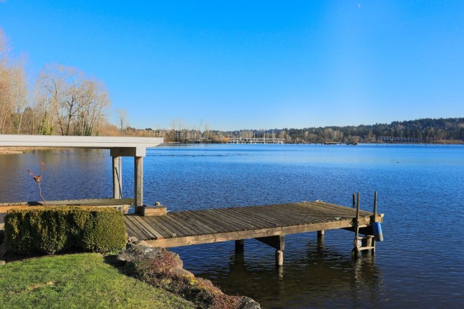 Picture of Private dock with jet ski lifts and covered boat lift Lake Washington