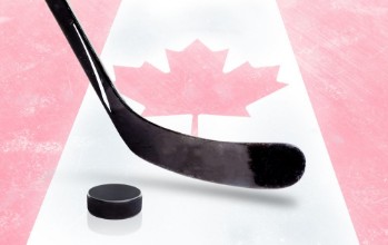 Afbeeldingen van Hockey Stick and Puck With Canadian Flag on Ice