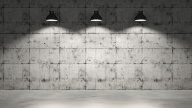 Image de Concrete wall with three lamps hanging