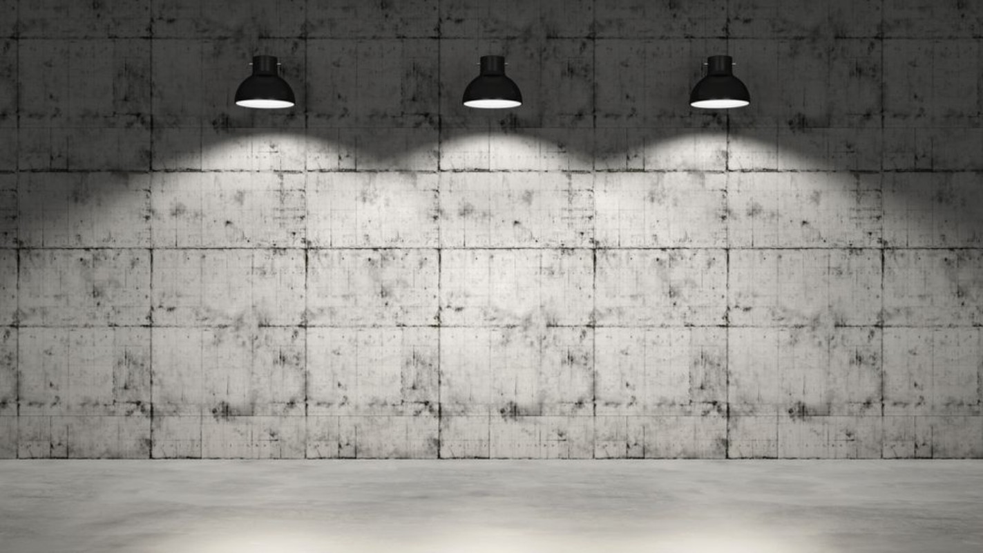 Picture of Concrete wall with three lamps hanging