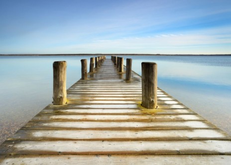 Picture of Wooden Pier with Hoarfrost leads into a calm clear  lake