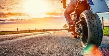 Afbeeldingen van Motorbike on the road riding having fun riding the empty road on a motorcycle tour  journey
