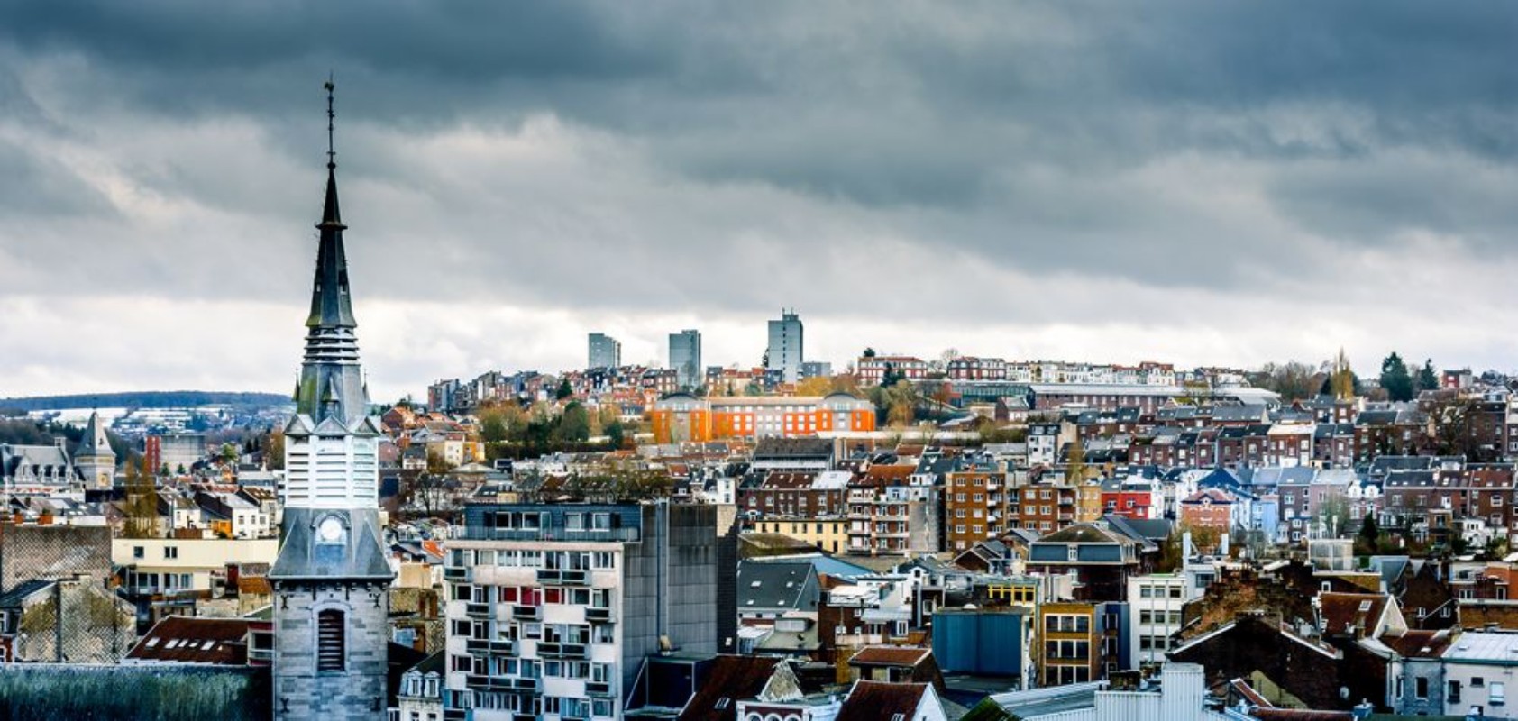 Picture of Tower of Notre-Dame des Rcollets church and cityscape of Verviers with a dramatic sky