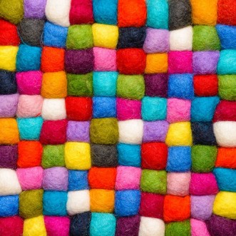 Image de Color wool background - balls of syntetic wool yarn - geometric rainbow pattern