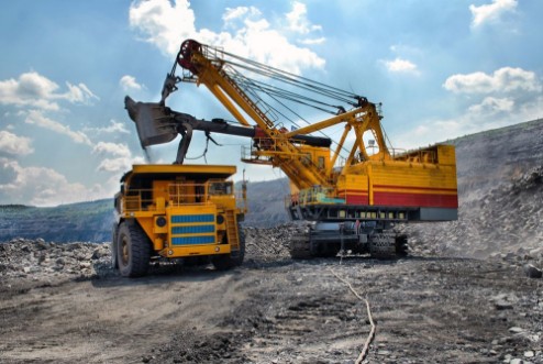 Picture of Loading of iron ore on very big dump-body truck
