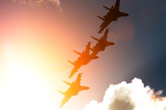 Picture of Aircraft fighter jets against the background of sky and sun