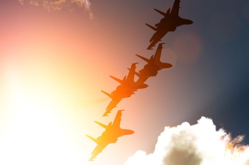 Bild von Aircraft fighter jets against the background of sky and sun