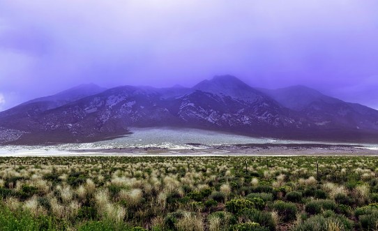 Picture of Dramatic fog coveredmountain and ranch field before a storm southern Colorado