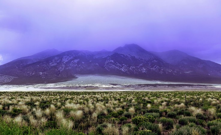Imagem de Dramatic fog coveredmountain and ranch field before a storm southern Colorado