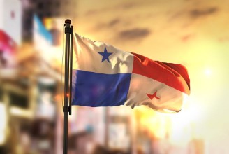 Picture of Panama Flag Against City Blurred Background At Sunrise Backlight
