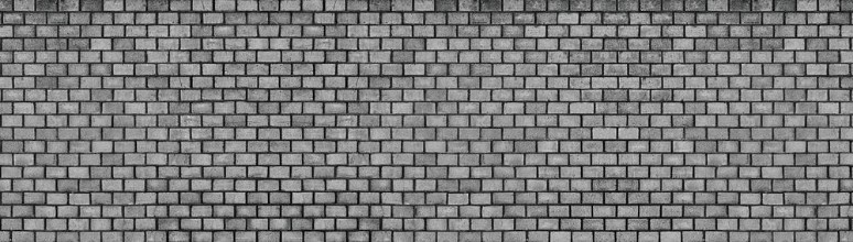 Bild på Dark brick wall texture of black stone blocks high resolution panorama