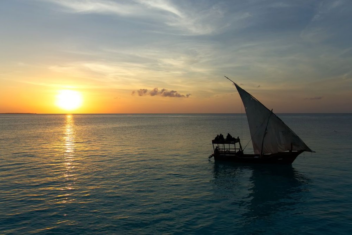 Picture of Stunning sunset captured north on Zanzibar Tanzania Africa Sailboat passing by