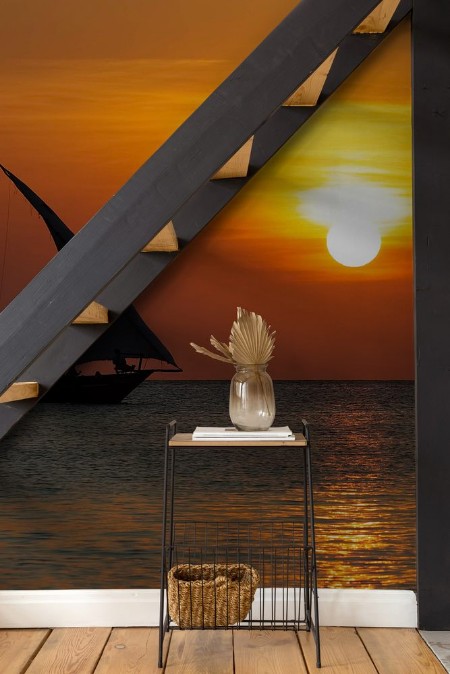 Afbeeldingen van Stunning sunset captured north on Zanzibar Tanzania Africa Sailboat passing by