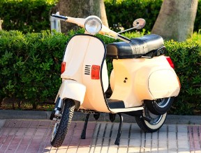 Bild på Motor scooter on the street