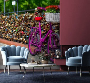 Pilt Pink bike standing on the bridge of love