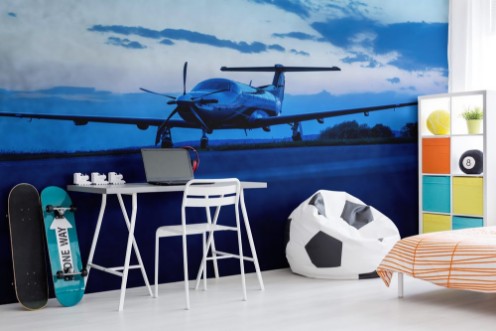 Poza cu Single turboprop aircraft on evening runway