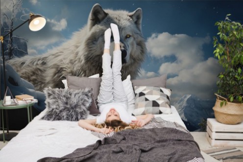 Bild på Snowy wolf in an Arctic landscape