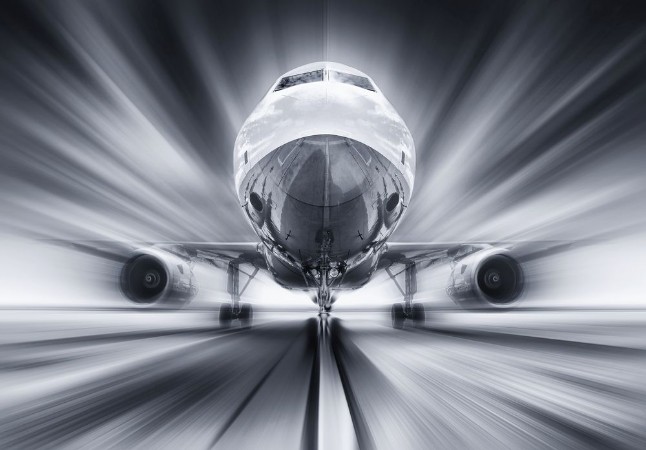 Bild på Aircraft on a runway while take off