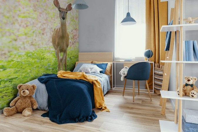 Picture of A lone doe stares at the camera in a clearing