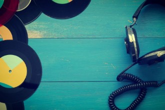 Picture of Vintage headphones with old vinyl records