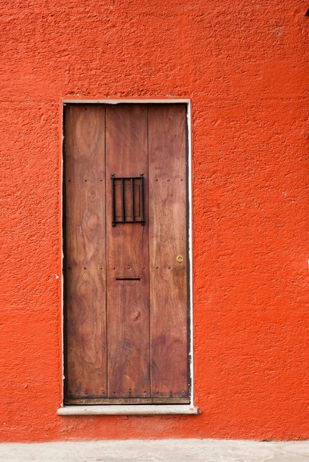 Picture of Window and wooden door in colonial house of La Antigua Guatemala Central America