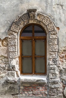 Image de Old window on ancient wall
