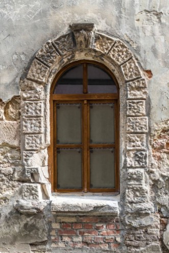 Picture of Old window on ancient wall